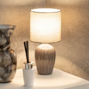 Picture of Classic Ceramic Base Table Lamp with Fluted Design, Fabric Lampshade, and LED Bulb