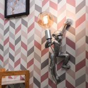 Picture of Modern Monkey Holding A Light Bulb Wall Light Fitting Vintage Filament LED Bulb